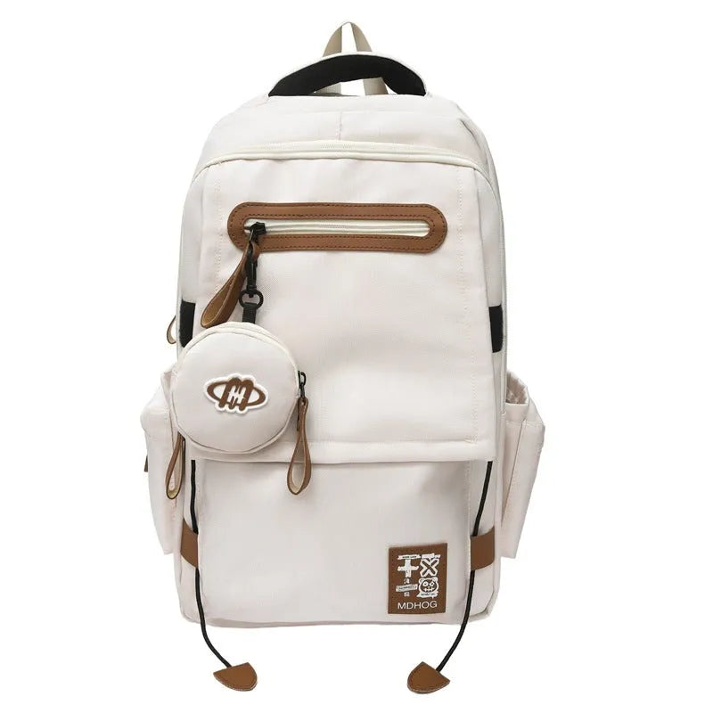 Japanese large capacity leisure travel backpack in khaki with contrast stitching and nylon waterproof finish