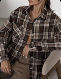 Dark brown striped retro women's shirt with long sleeves and collar styling
