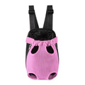 Convertible dog carrier backpack worn on front with small dog inside, showing adjustable straps and breathable mesh panels