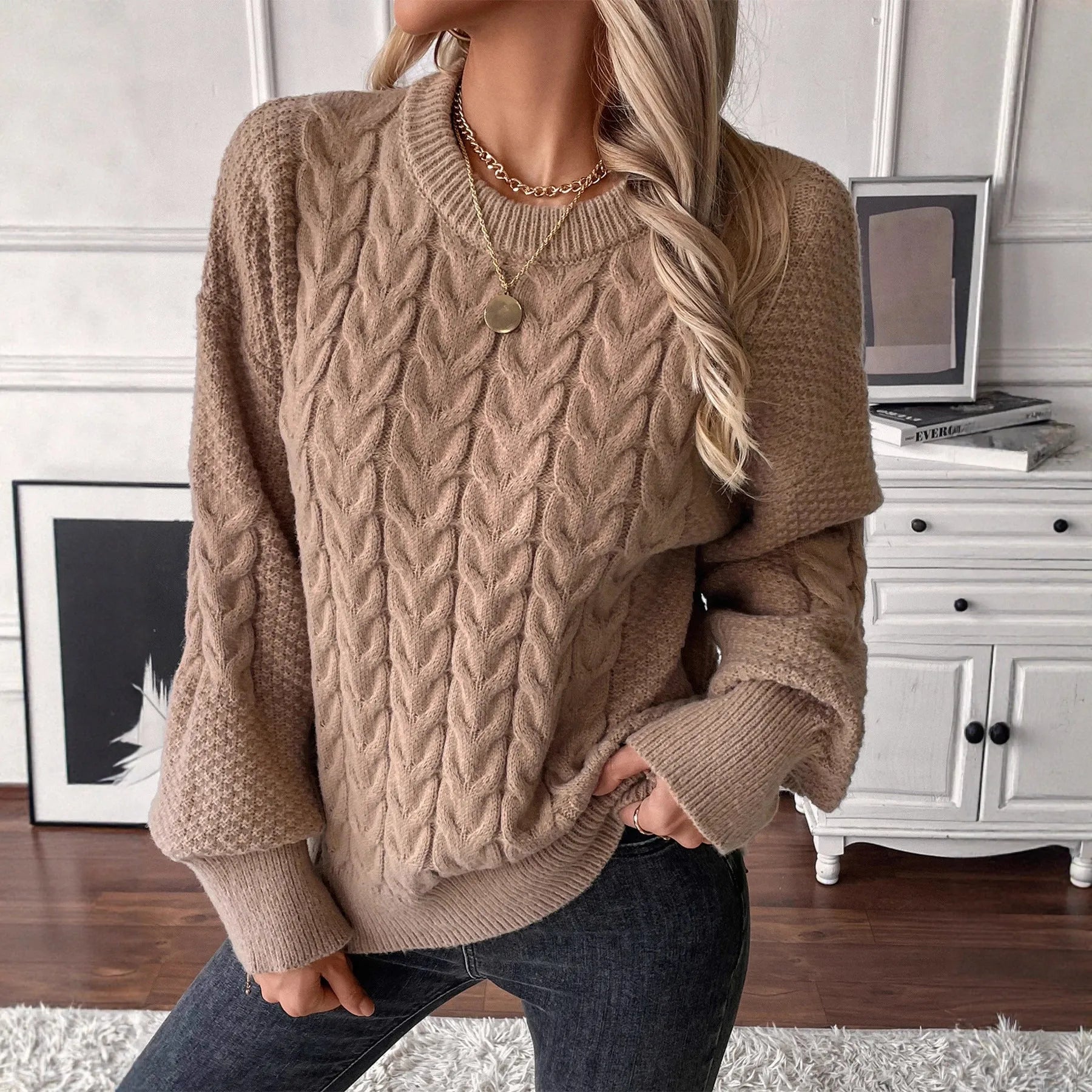Women's loose fit round neck casual sweater in khaki colour with twist thread design detail.