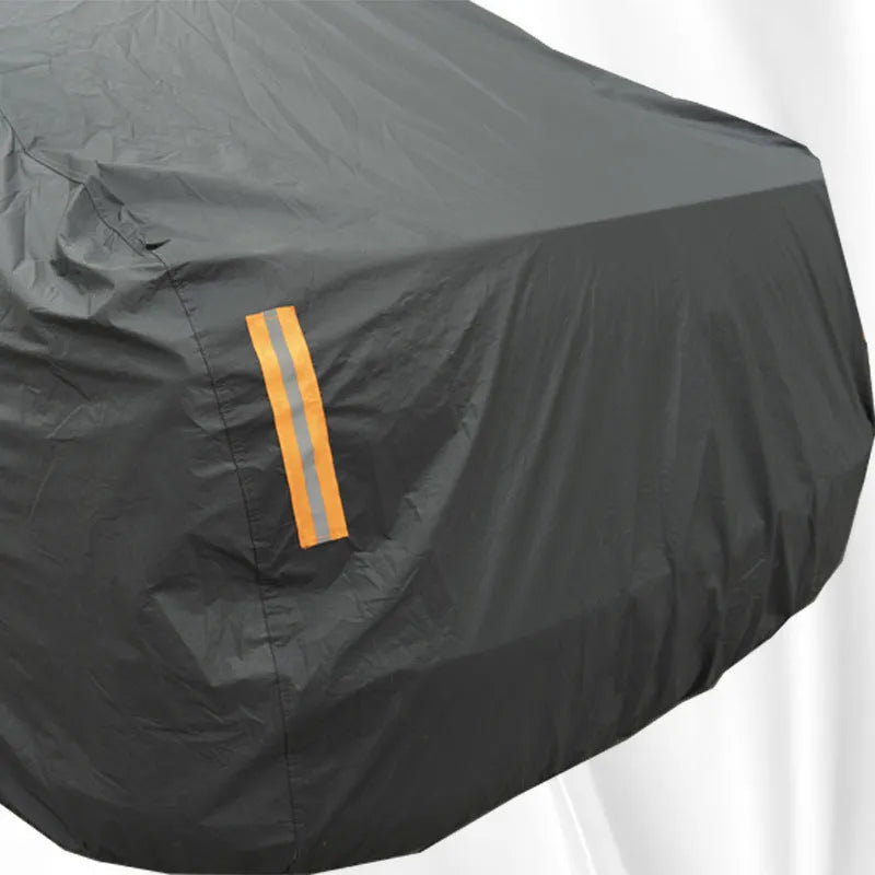 Grey Volkswagen car cover with rainproof sun protection features shown fitted on vehicle