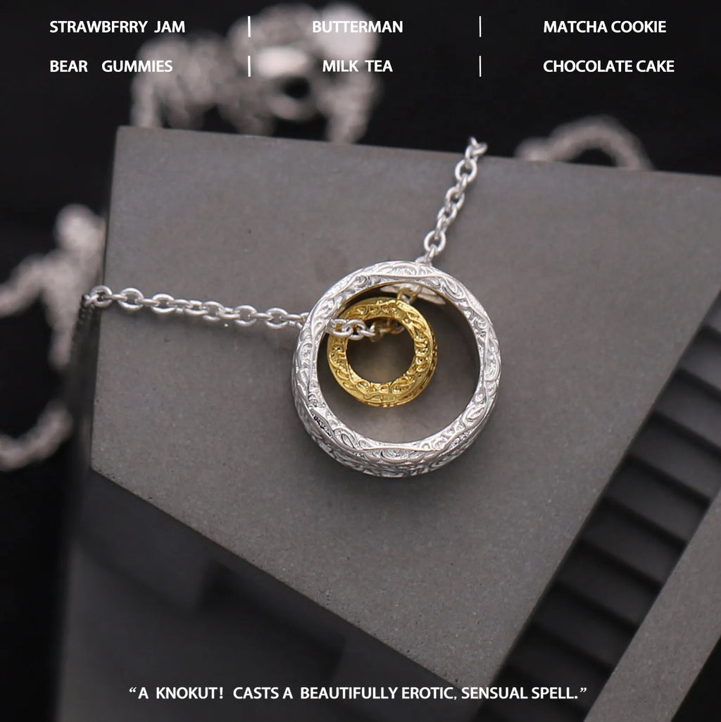 Textured gold and silver copper nested necklace with round and ring geometric shapes