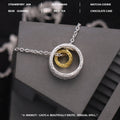 Textured gold and silver copper nested necklace with round and ring geometric shapes