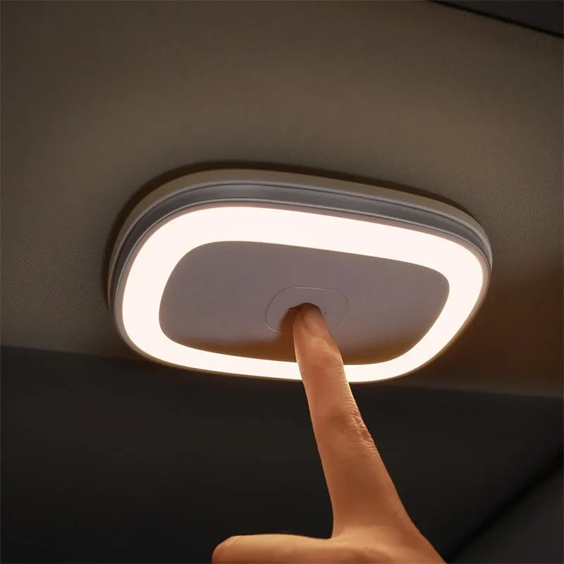 LED car reading light in black, USB rechargeable with 400mAh battery, two brightness gears, compact design