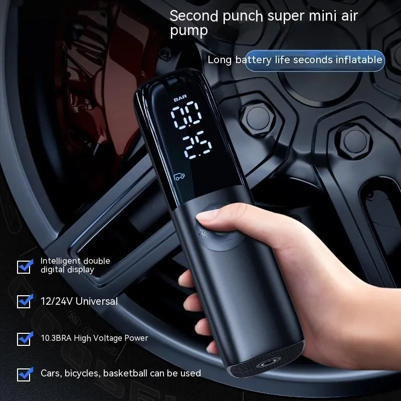 Black portable electric vehicle air pump with dual voltage and built-in tyre pressure gauge