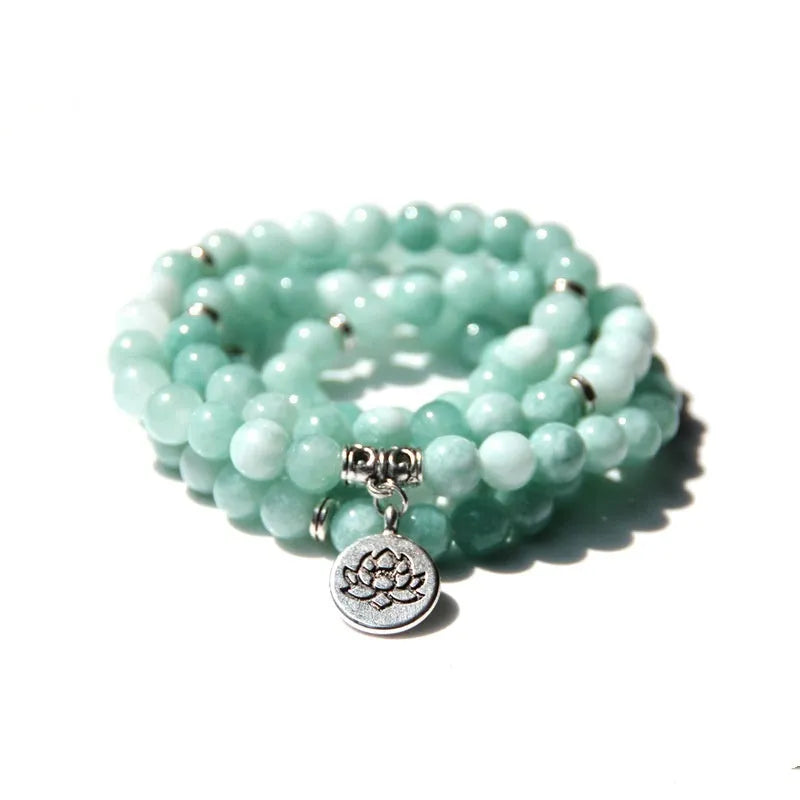 Women's bracelet with natural stone lotus pendant in geometric design showing eight colour variations