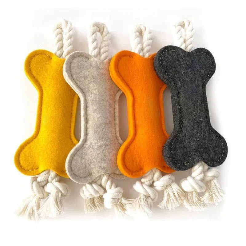 Bone shaped dog toy with rope knot design in choice of four colours for bite resistant training