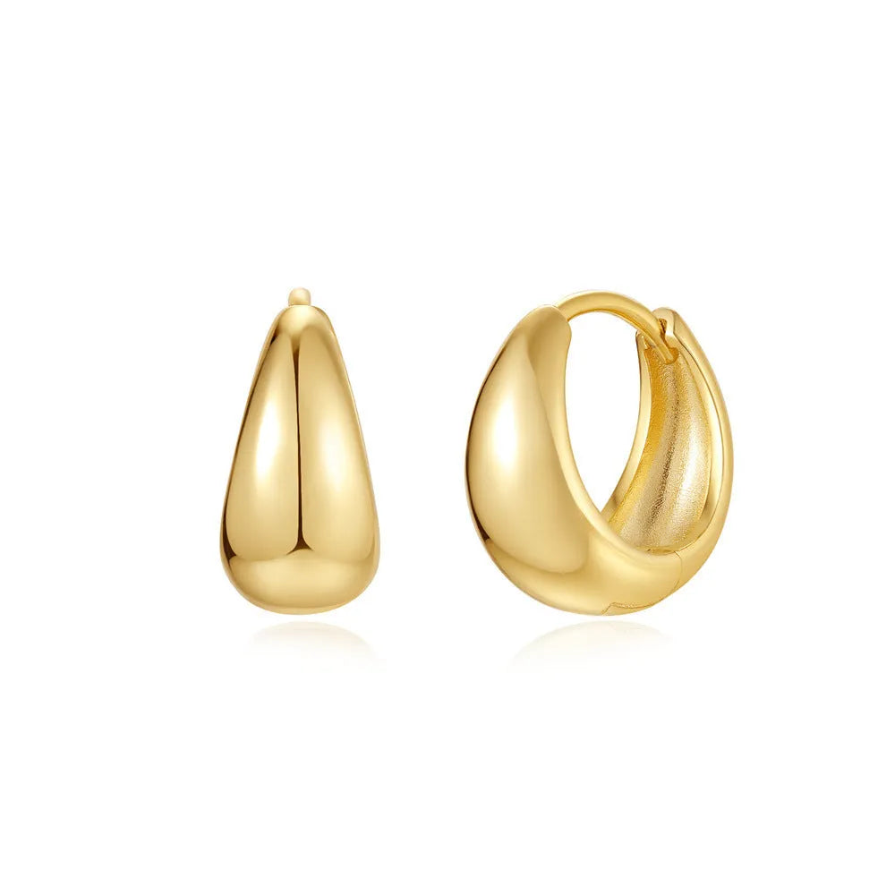 Golden brass diamond earclip earrings with geometric round design and butterfly backings