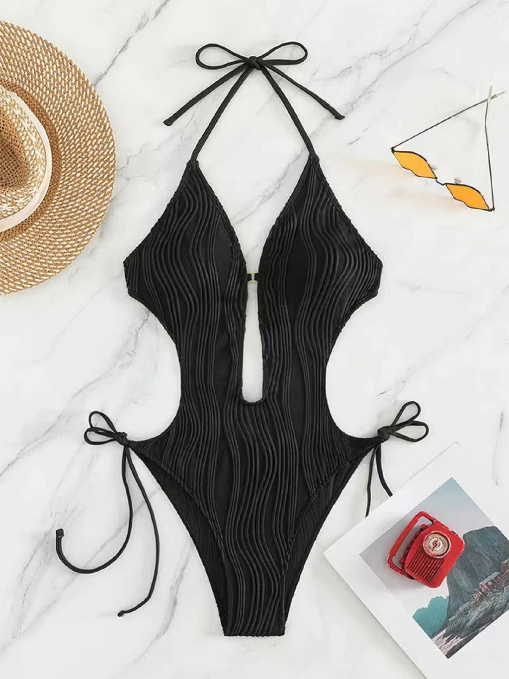 Women's black lace-up triangle bikini swimsuit with solid colour design