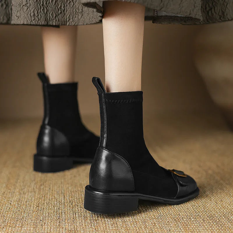 Women's black low heel Martin boots with belt buckle stitching and front lace-up design