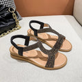 Women's patent leather summer sandals with rhinestone decoration in gold, silver, or black colours