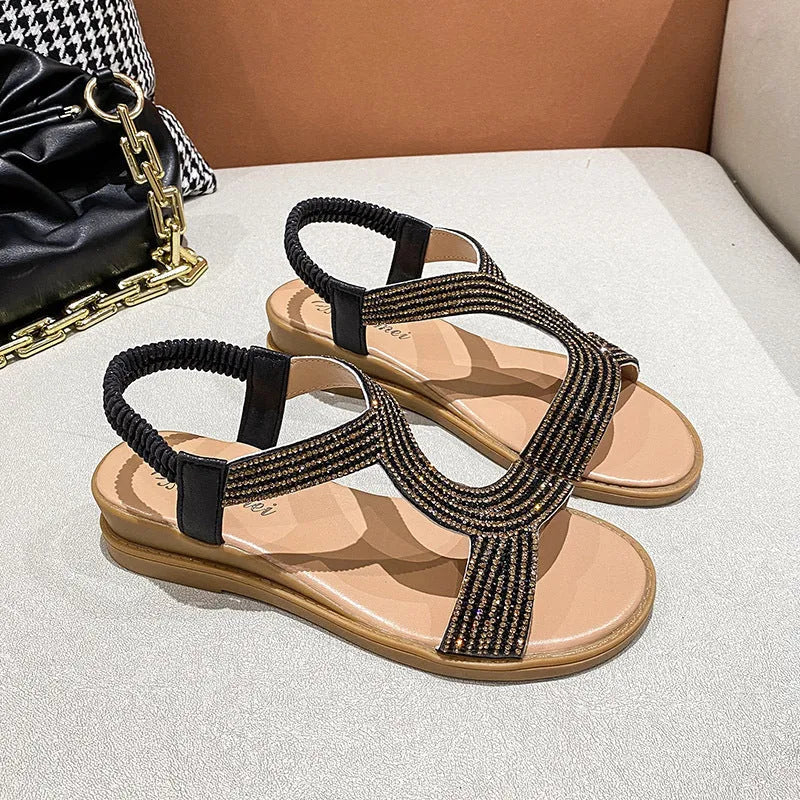 Women's patent leather summer sandals with rhinestone decoration in gold, silver, or black colours