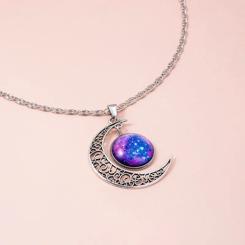 Silver hollow moon pendant necklace with glass star insert on Figaro chain for women
