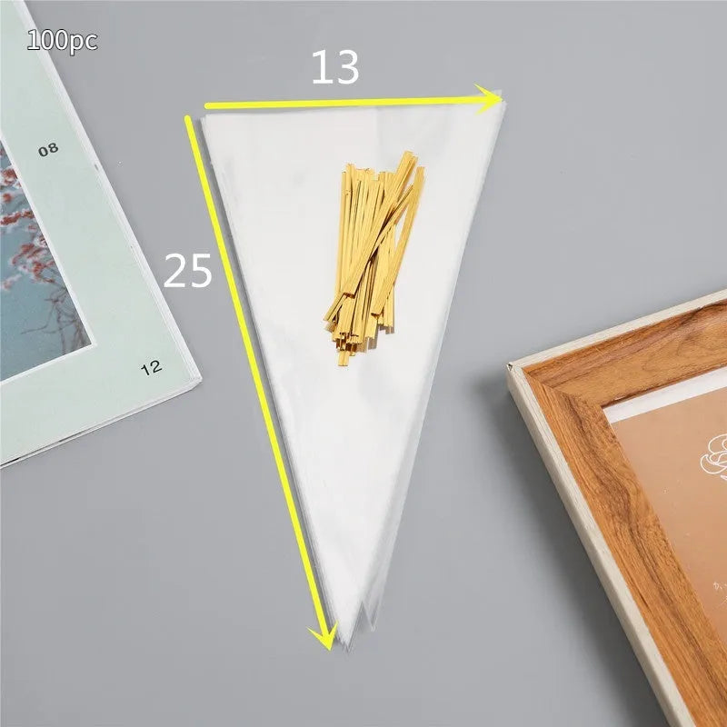 Transparent triangular plastic bag with a red wire tie closure.