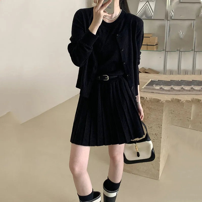 Women's grey knitted vest skirt and cardigan two-piece set with 3D pattern