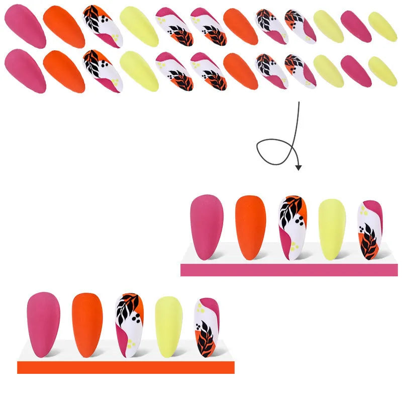 Wear Armour medium almond nail stickers in frosted French leaves, macaron, leopard print, and plating designs.