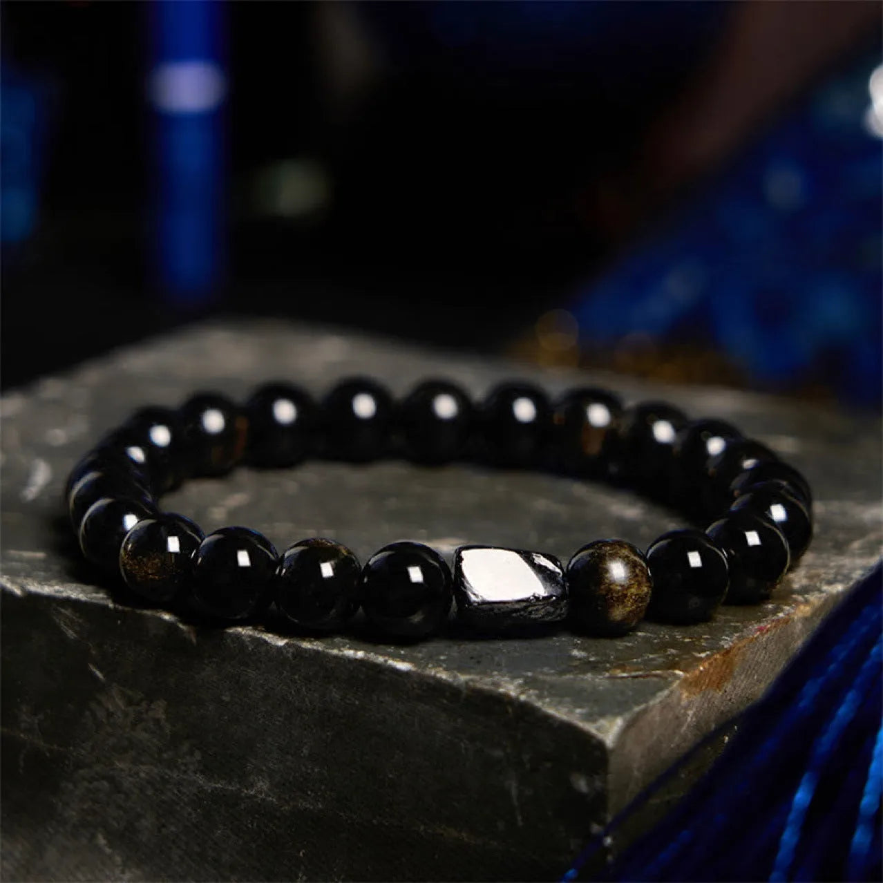 Natural obsidian single bead bracelet with 8mm diameter stone and retro constellation detailing on metal components