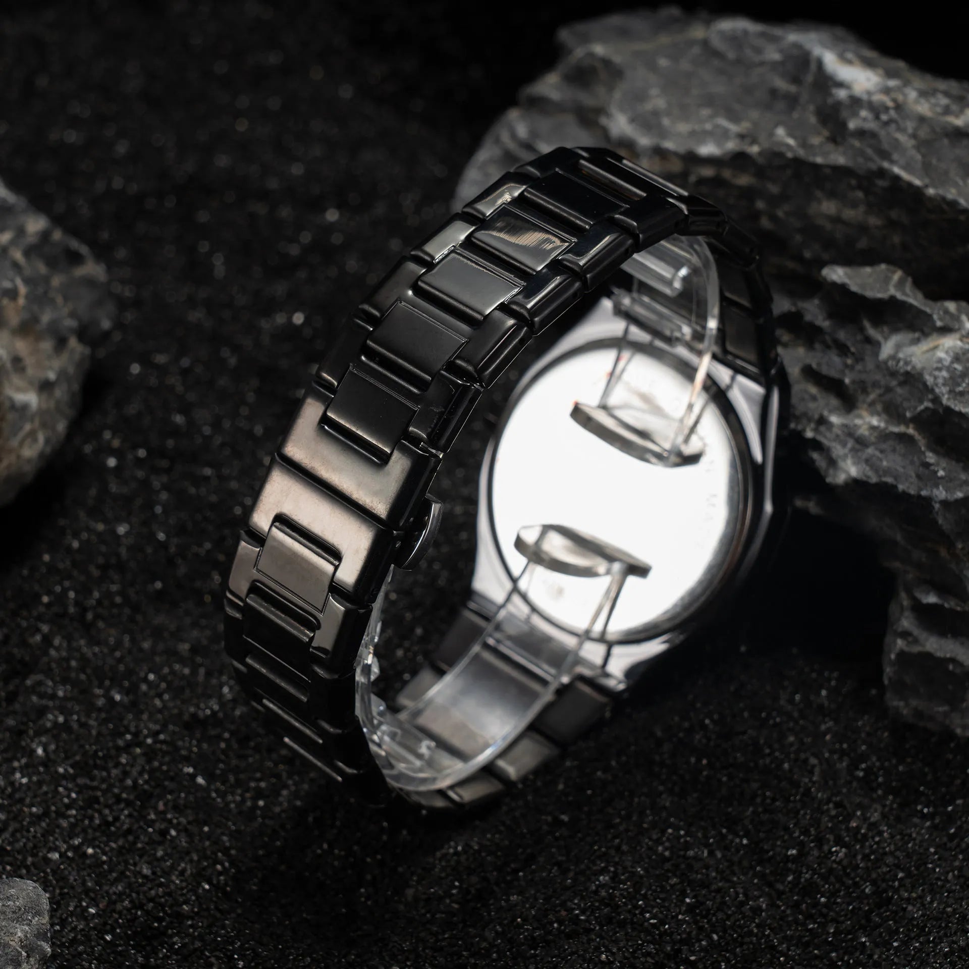 Business casual men's watch with steel strap and quartz movement, shown in black, silver, and black silver scale colour options.