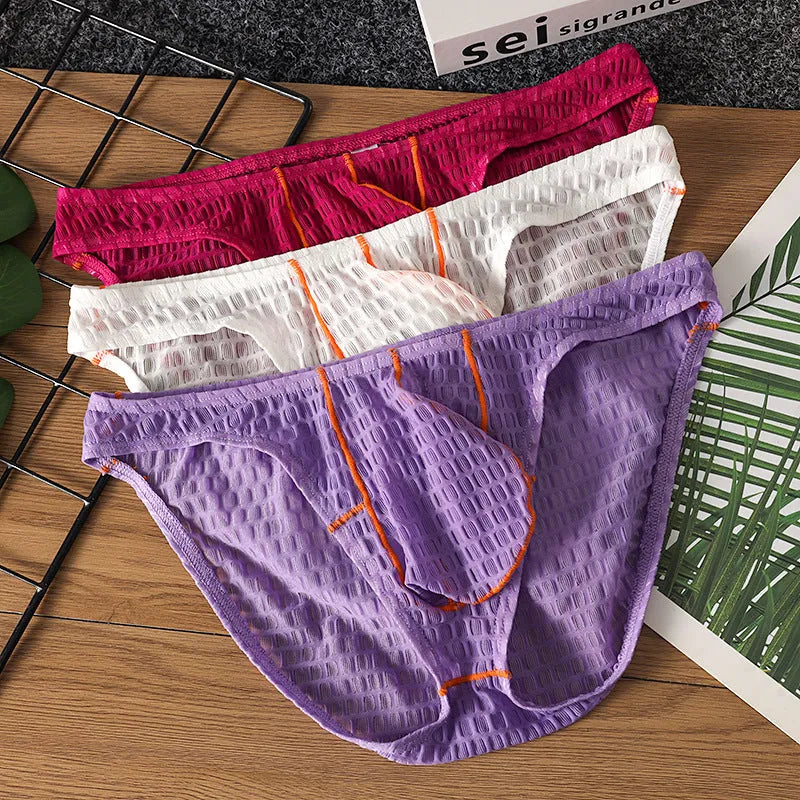 Men's low-waist lace briefs in ice silk fabric on a white background, shown in green colour.