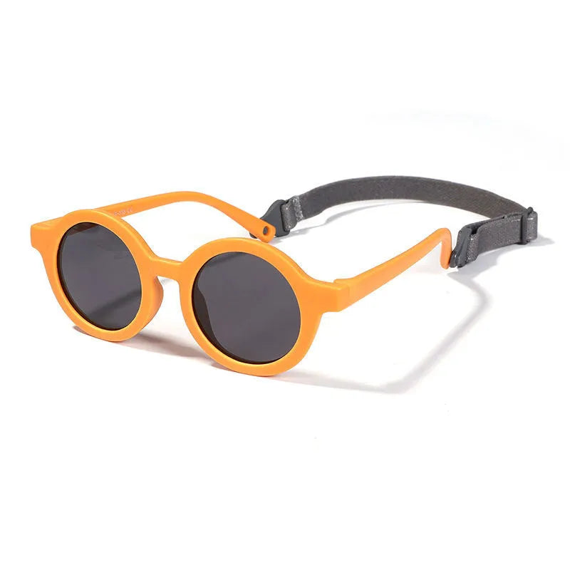 Children's round sunglasses for 0-3 year olds with UV400 protection, shown in a selection of colours.