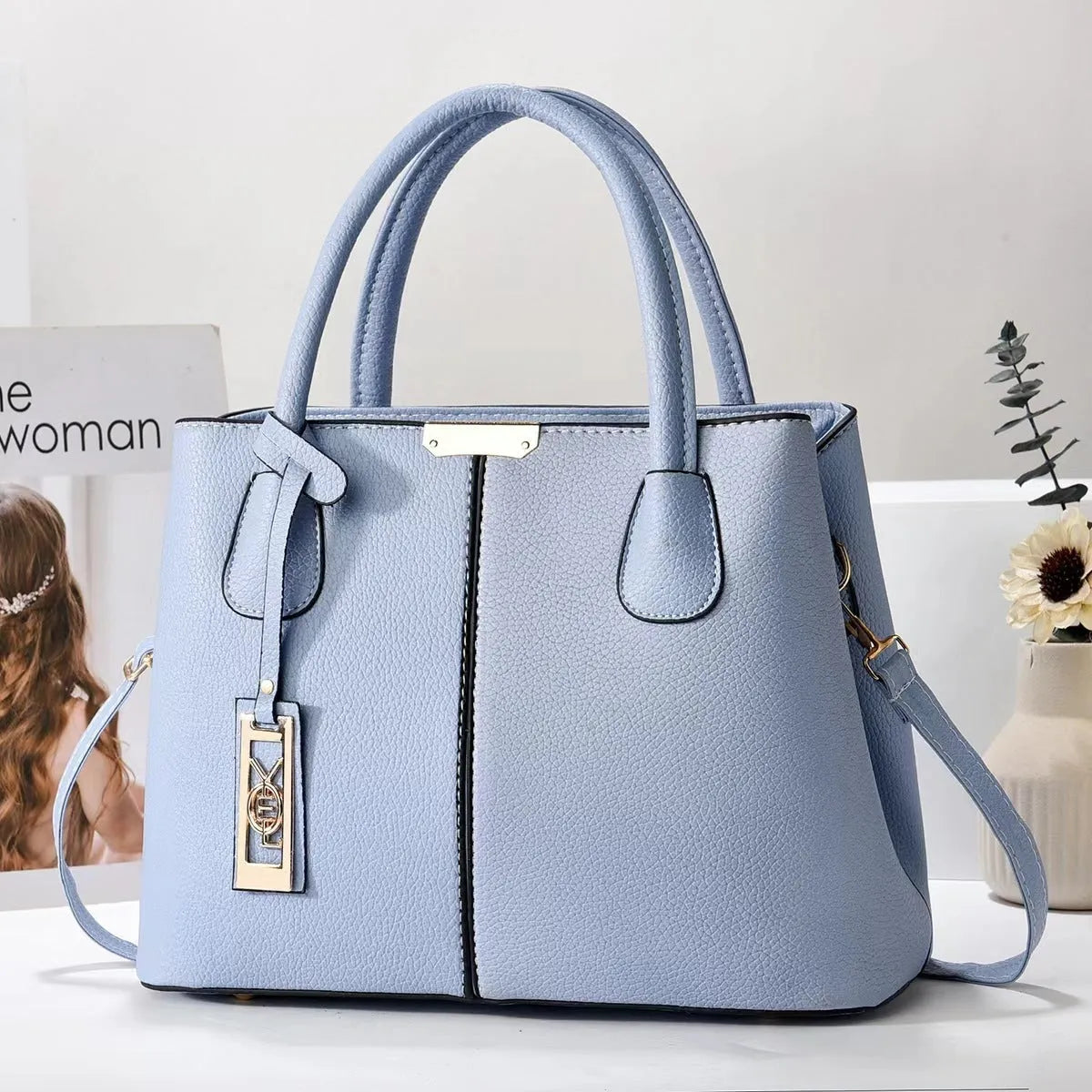 Soft PU fashion handbag with leather shoulder strap in horizontal square shape