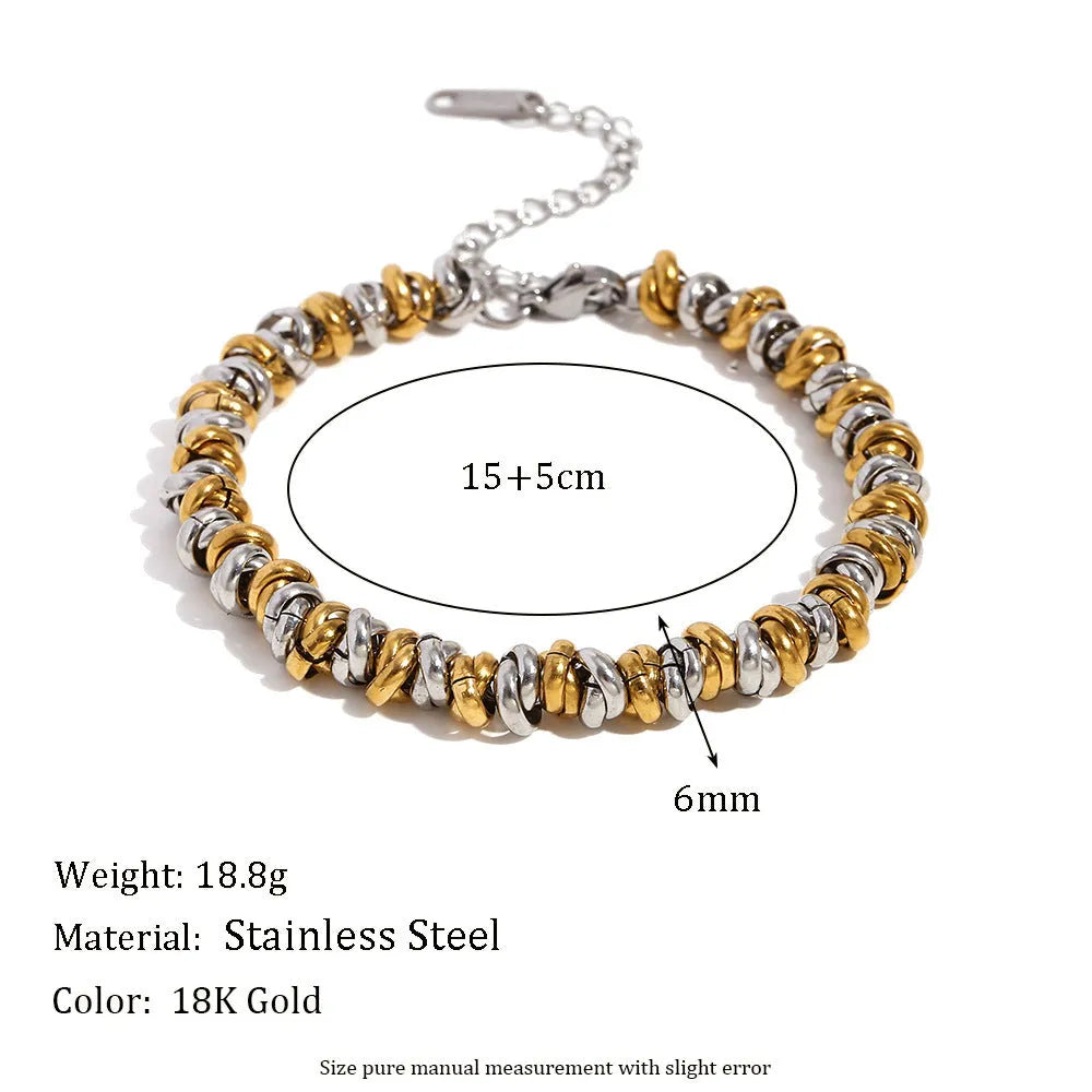 Gold geometric circle design jewellery set with earrings, necklace and bracelet