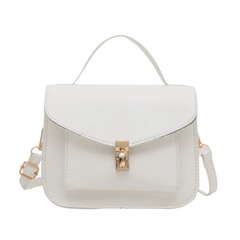 Retro style shoulder messenger bag in horizontal square shape with crossbody strap