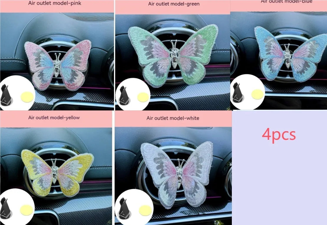 Moving embroidery butterfly decoration on car centre console air vent in pink fabric