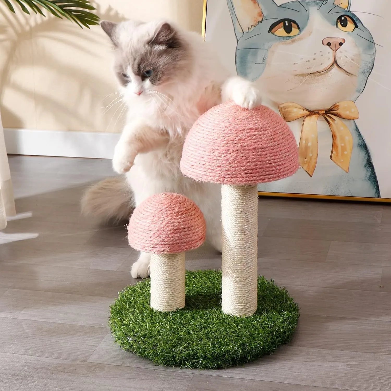 Pink mushroom-shaped cat scratching post with natural sisal caps and pole for kittens