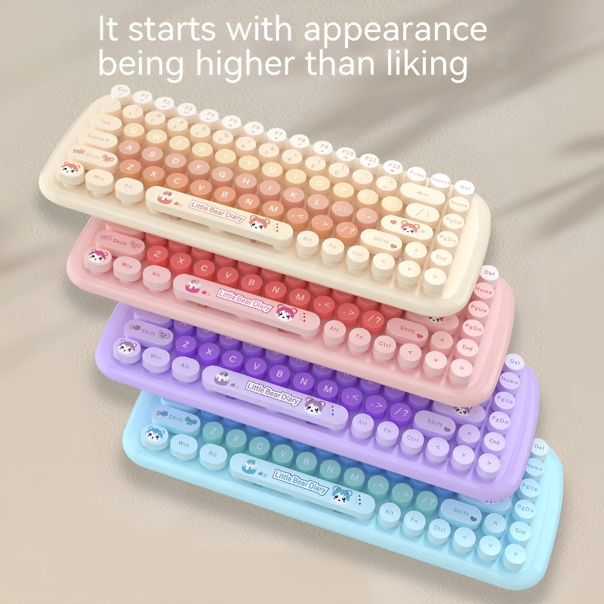 Pink mini cartoon-style wireless keyboard and mouse set on a desk with receiver.