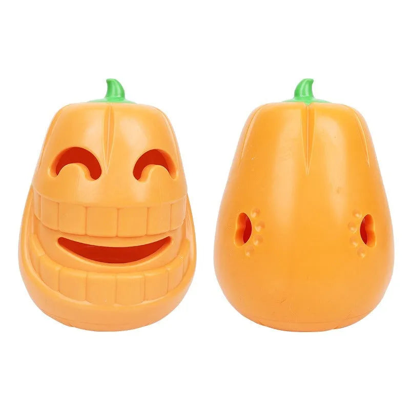 Orange Halloween pumpkin shaped rubber dog toy with a central treat-dispensing funnel.