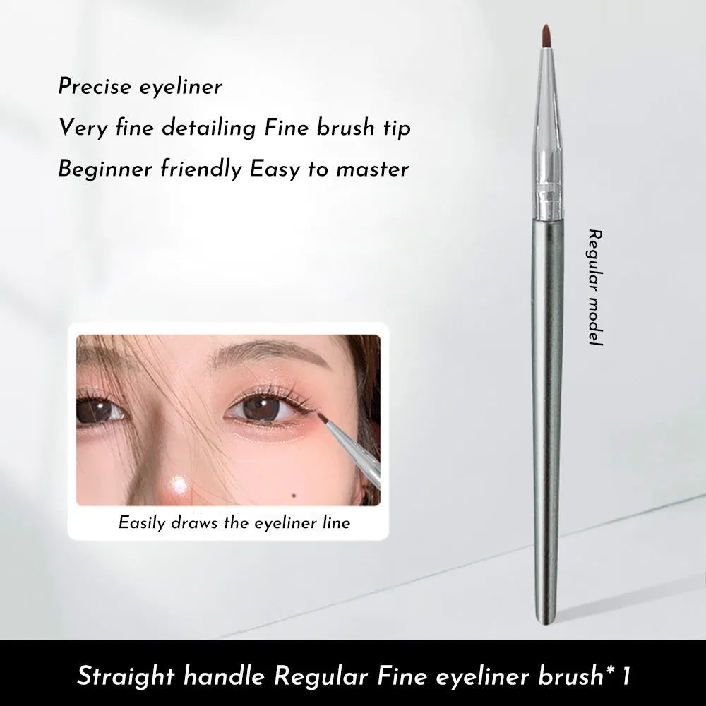 Close-up of a bent-head makeup brush with a fine, angled tip for eyeliner and detail work.