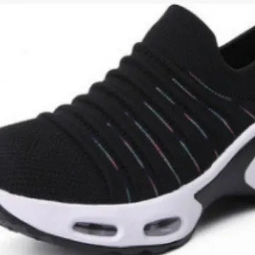 Women's fly-knit stretch sock shoes in light grey with low heel and round toe.