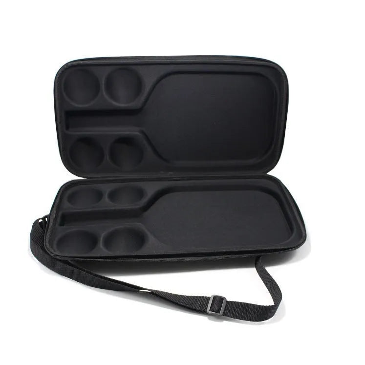 Black waterproof pickleball storage case with double shoulder straps showing organised interior compartments