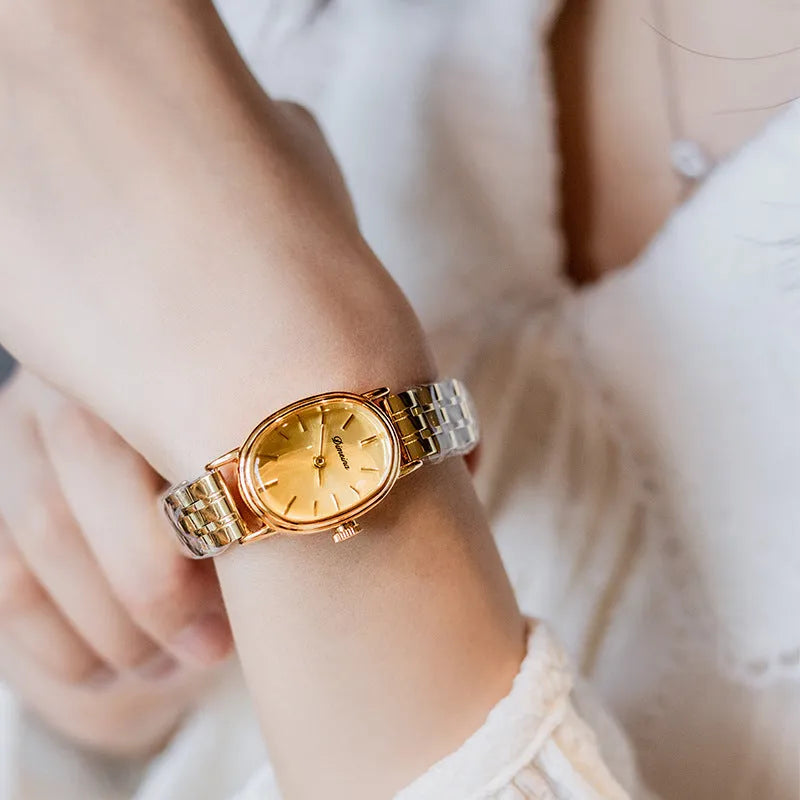 Oval mid-ancient steel watch for women with gold surface and red noodles, 7mm thin antique style dial