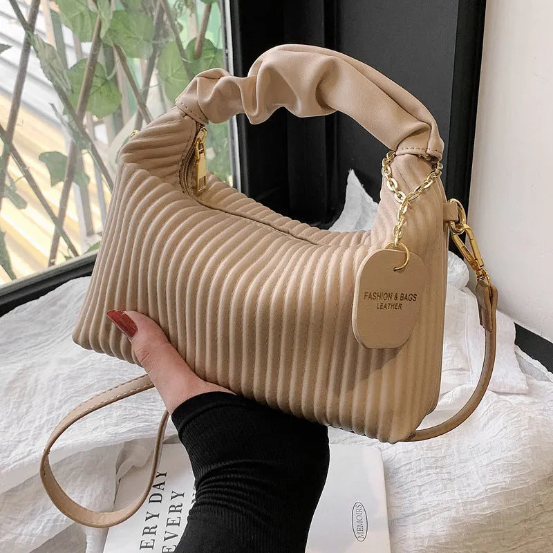 Women's PU leather pleated cloud crossbody bag in black front view