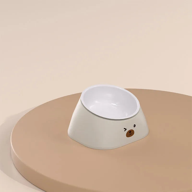 Green tilted stainless steel pet bowl with white PP base at 15-degree angle for cat or dog feeding