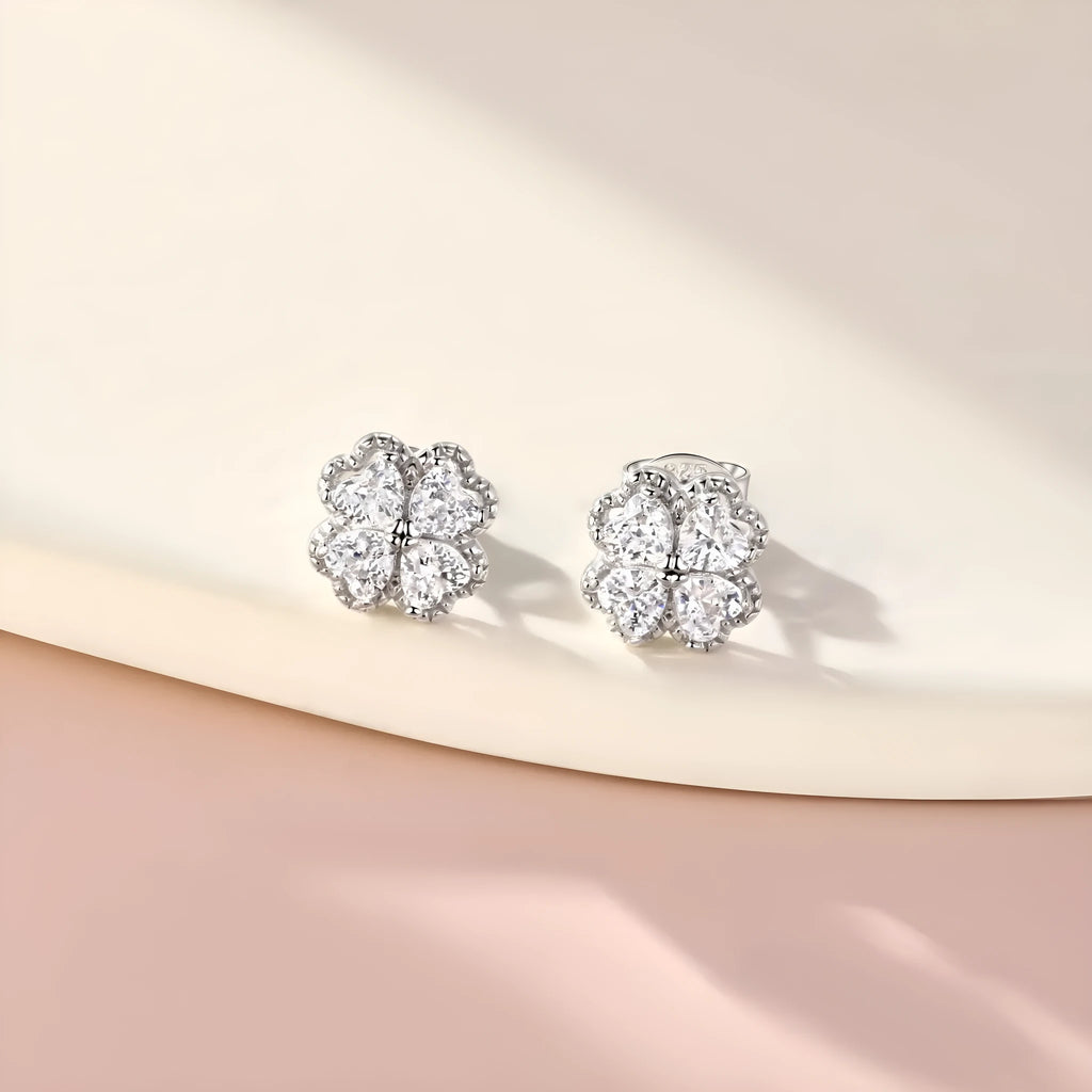 Zeng Yin women's 925 silver heart-shaped earrings with white zircon stones in white gold colour.