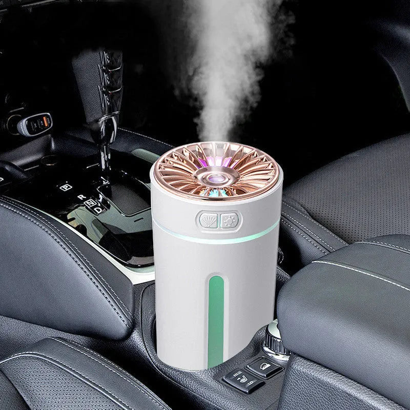 Black and white rechargeable USB humidifier with colourful lights for car and desk use.