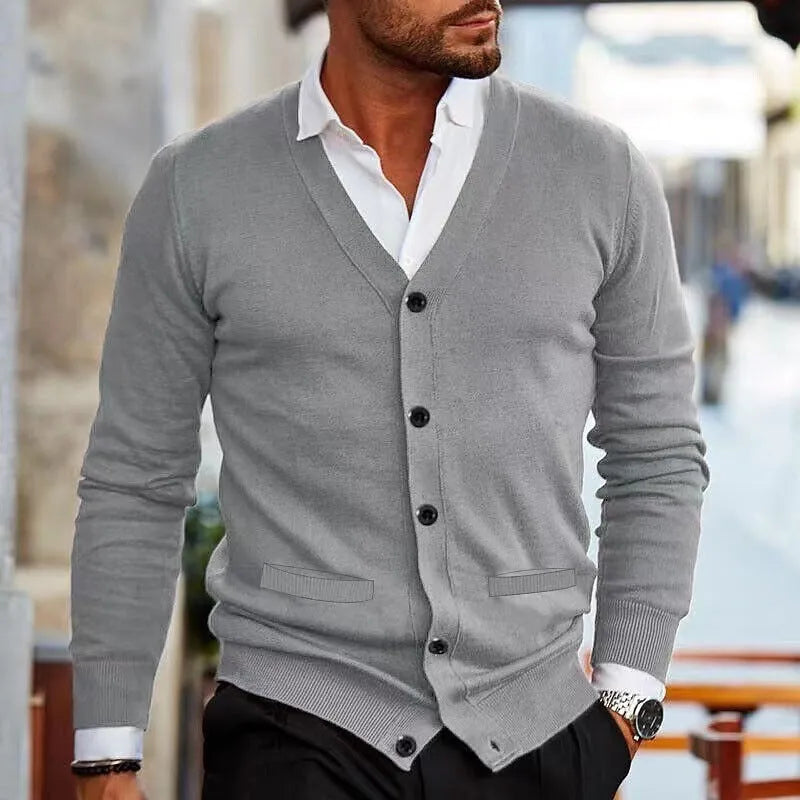 Men's slim fit acrylic cardigan sweater coat in dark grey, shown open over a t-shirt.