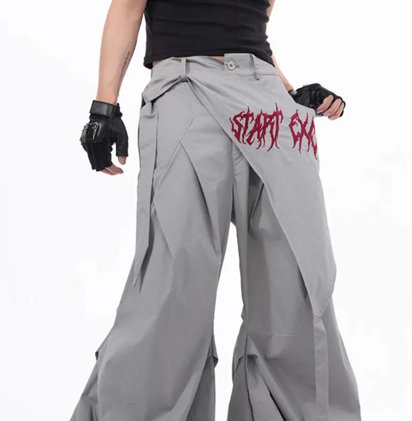 Boy modelling black wide-leg Korean-style summer pants on a casual backdrop.