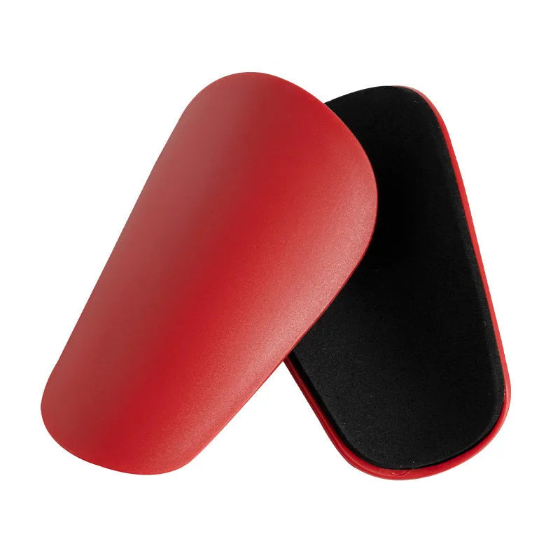 PU mini shin guards in black, white, red, and dream blue colours with S and XS sizing codes