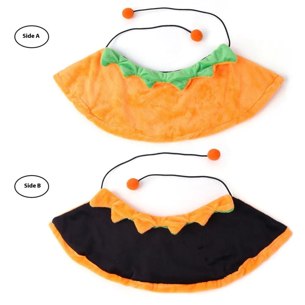 Orange reversible plush Halloween cloak for a dog or cat with pumpkin design.