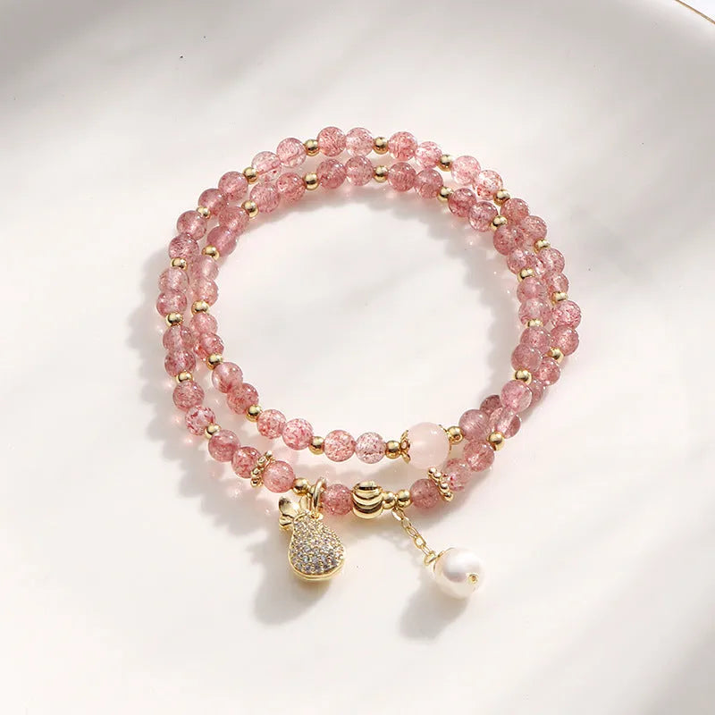 Women's geometric strawberry quartz crystal bracelet with adjustable fitting for money drawing