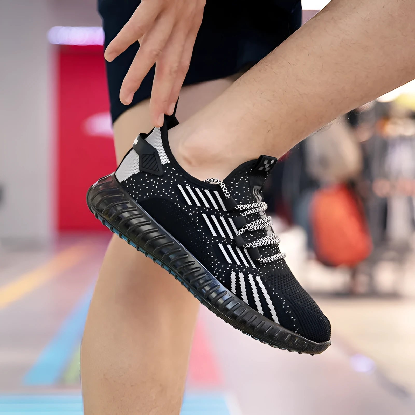 Men's breathable Flying Fabric sports shoes in black with mesh lining and platform heel