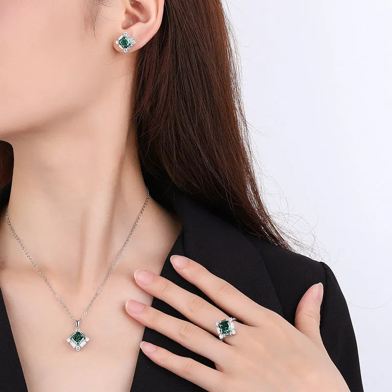 S925 silver emerald diamond jewellery set with necklace earrings and ring on display