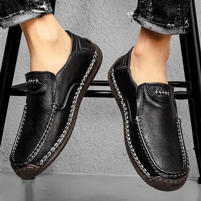 Men's casual leather shoes in black with soft rubber sole, round toe, and low heel