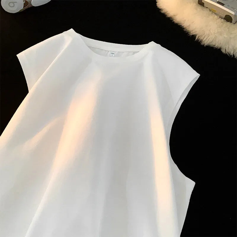 Men's loose fit sleeveless cotton tank top in solid colour on a hanger