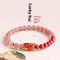 Purple cinnabar and strawberry quartz bracelet with koi and peach blossom Chinese lucky symbols
