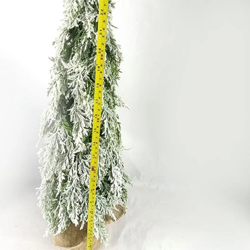 Small 24-inch white Christmas tree with lights and snow-covered branches for desktop decoration